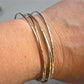 Skinny Thin Shiny Hammered Mixed Metal Forged Bracelet Statement Silver and Gold Skinny Bangle Stack
